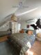 Wohn- und Geschäftshaus plus Nebengebäude und Grundstück - Ferienhaus Schlafzimmer OG.