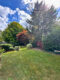 Einfamilienhaus mit Wintergarten, Garage + parkähnlichem Garten - Gartenansicht