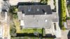 Freistehehendes Einfamilienhaus mit ELW, Garten und 2 Garagen - Drohnenaufnahme des Grundstücks