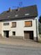 Großzügiges Einfamilienhaus mit Garage und kleinem Garten - Ansicht