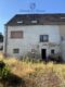 Großzügiges Einfamilienhaus mit Garage und kleinem Garten - Rückseite