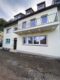 Hochwertig renovierte und möblierte 2-ZKB mit EBK, Terrasse + Garage - Front