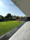 Großzügige Wohnung mit EBK, eigenem Eingang, Garten & 2 Stellplätzen - Überdachte Terrasse
