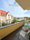 Bestens vermietetes Wohn- + Geschäftshaus mit Garagenpark in Top-Lage und -Zustand - Balkon 1.OG